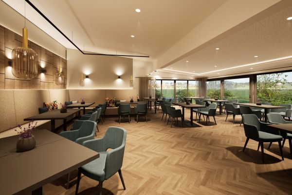 Conservatory restaurant at Hotel Churfürstenhof with herringbone parquet, blue armchairs and panoramic windows